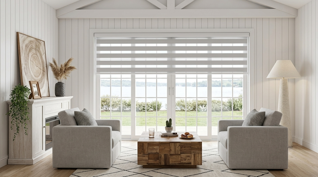 LUSTROWIN light gray custom zebra shades with light-filtering fabric on a large sliding glass door in a cozy modern organic living room.