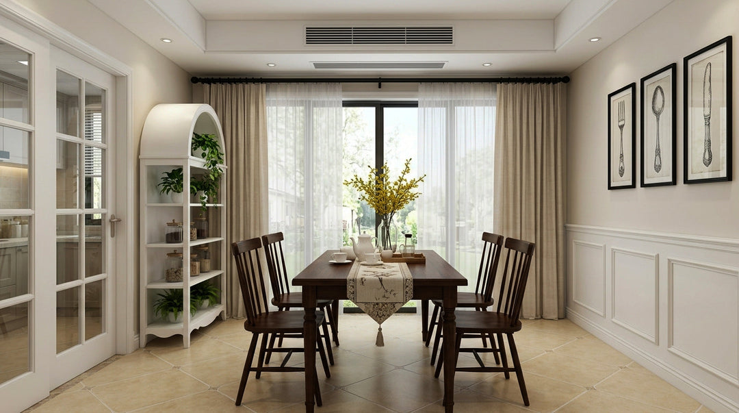 Elegant dining room featuring beige drapery panels, sliding glass doors, and wainscoting.